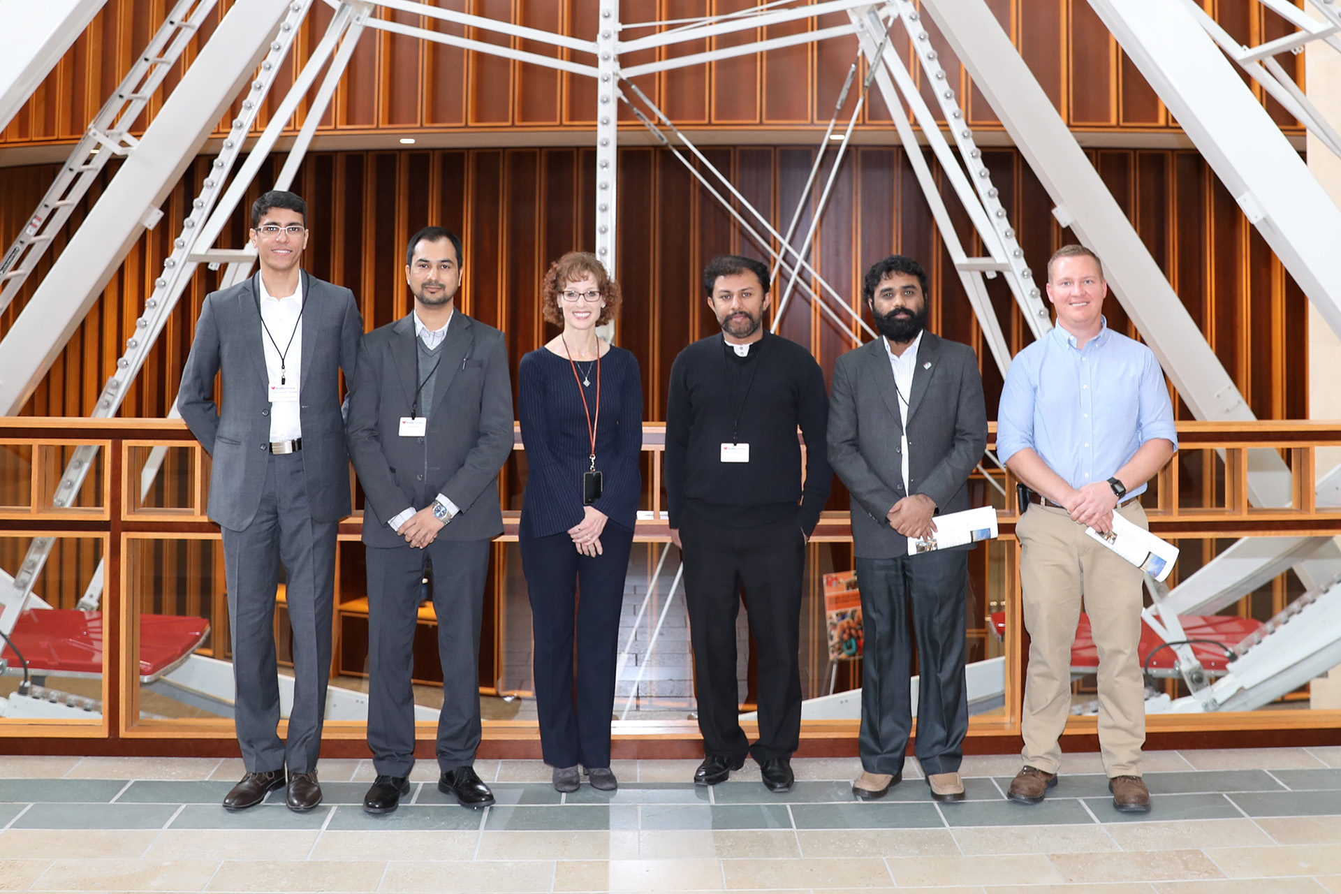 International Visitor Leadership Program guests toured Acuity’s Sheboygan headquarters campus to learn about how the company addressed air quality in its recently completed expansion project. From left to right are Dr. Hem Himanshu Dholakia, Research Associate, Council on Energy, Environment & Water; Dr. Suresh Jain, Professor, Department of Natural Resources, TERI University; Sheri Murphy, Vice President - Services and Administration, Acuity; Mr. Sumit Sharma, Fellow, The Energy and Resources Institute; Sameera Kumar Anthapur Gopalakrishna, Transport/Vehicular Pollution Researcher, Clean Air Initiative for Asian Cities; and Kurt Lodl, General Manager - Maintenance, Acuity.