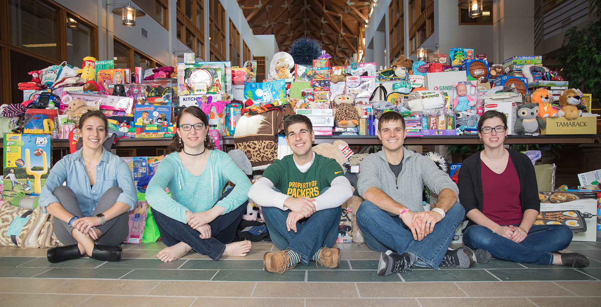 From left to right, staff members of Acuity’s Employee Activity Committee (EAC) who organized the gift drive: Monica Rincon, Hannah Miller, Nick Laurie, Tim Muldoon, and Hannah Favret.