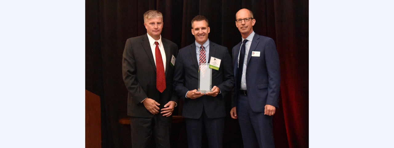 Territory Director Brian Little (left) and Sales General Manager John Kautzer (center) receive Acuity’s 2018 PIA National Company Award of Excellence from PIA National President Tim Russell. The award was presented on September 28 in Portland, Maine, at a gala ceremony held in conjunction with PIA’s Board of Directors meeting.
