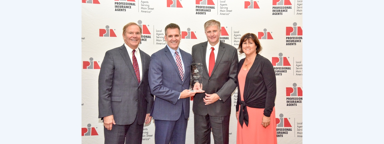 Acuity received the 2018 PIA National Company Award of Excellence from the National Association of Professional Insurance Agents. Pictured with the award are Acuity’s John Kautzer, General Manager - Sales (center left) and Brian Little, Territory Director ME, NH, VT (center right). Also joining Acuity are Dennis Kuhnke, incoming PIA National President-Elect and Vice President at Robertson Ryan & Associates (left) and Jodi Cordes, Commercial Insurance Agent at Glass Insurance Center and Past President of the PIA of Wisconsin (right).