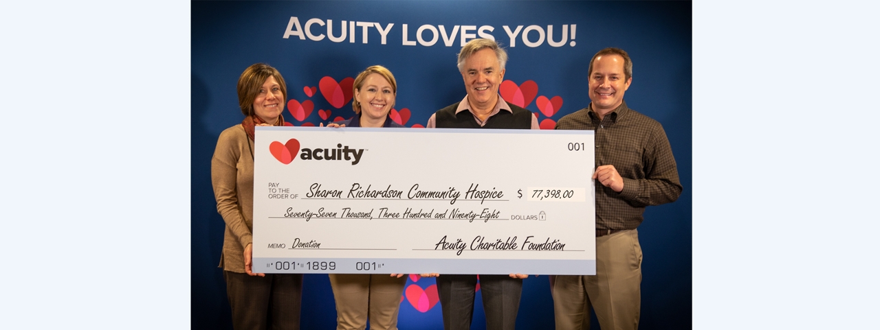 Sharon Richardson: Charmaine Conrad, Director of Development and Communications (far left), and volunteer Deanne Perez from Sharon S. Richardson Community Hospice accept a check for over $77,000 from Acuity President and CEO Ben Salzmann (left) and Shane Paltzer, Vice President - Personal Lines and Marketing.