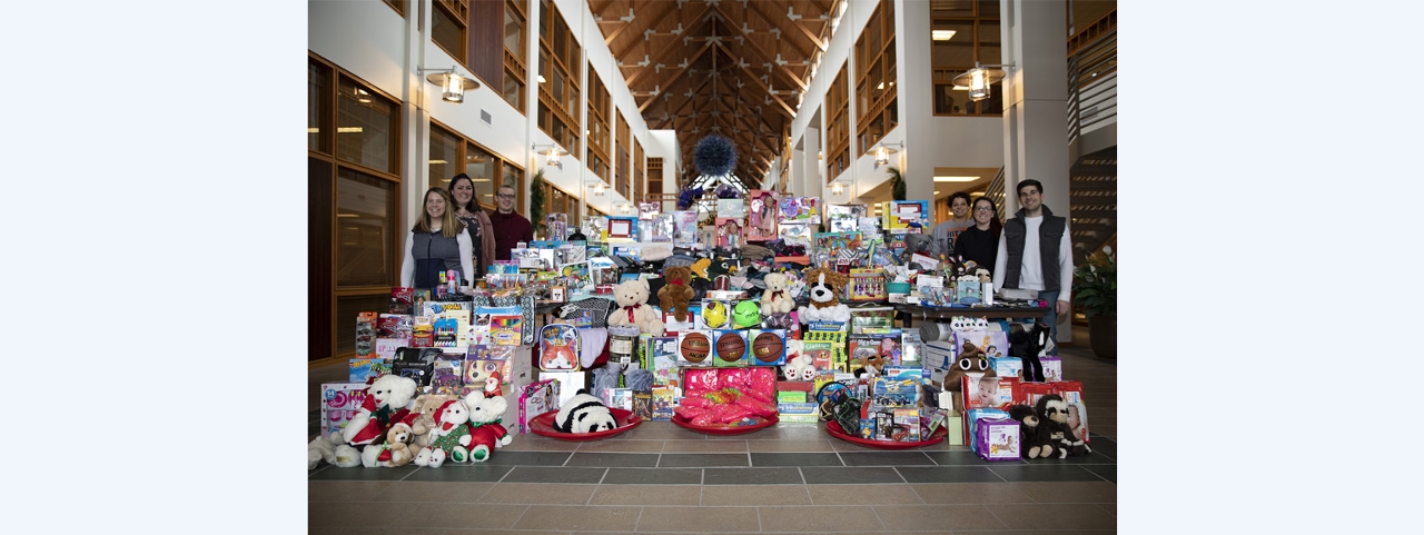 From left to right, members of Acuity’s Employee Activity Committee (EAC) who organized the gift drive are Kate Jaehnke, Brittaney Prosser, Corbin Mosher, Sanja Boor, Sarah Horne, and Nick Laurie.