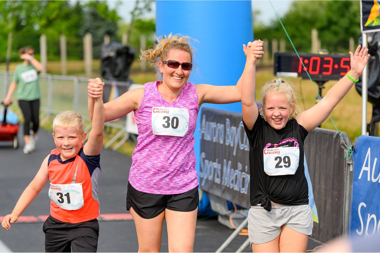 Finish line walkers: The family-friendly Acuity Health Challenge featured a 5K or 2-mile run/walk course.