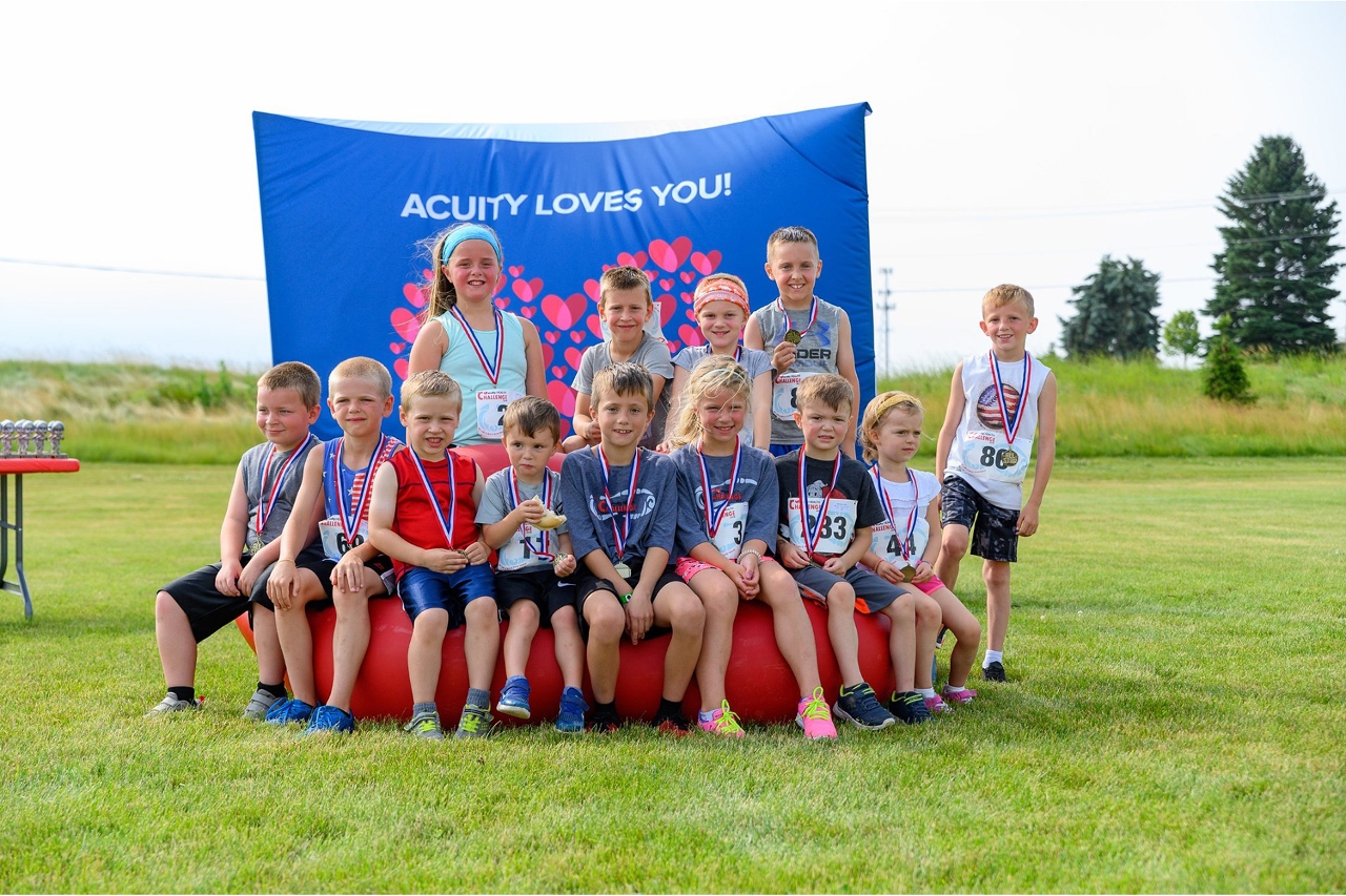 Kids at the AHC: Some of the many children who participated in the 2019 Acuity Health Challenge show off their finishers’ medals.