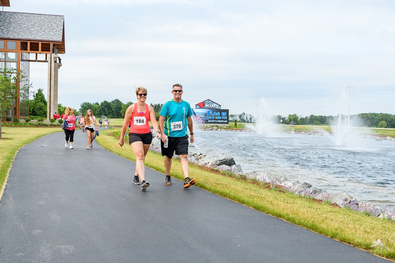 Walkers on the AHC course: In its eighth year, the Acuity Health Challenge was held for the first time on Acuity’s headquarters campus in Sheboygan in 2019.