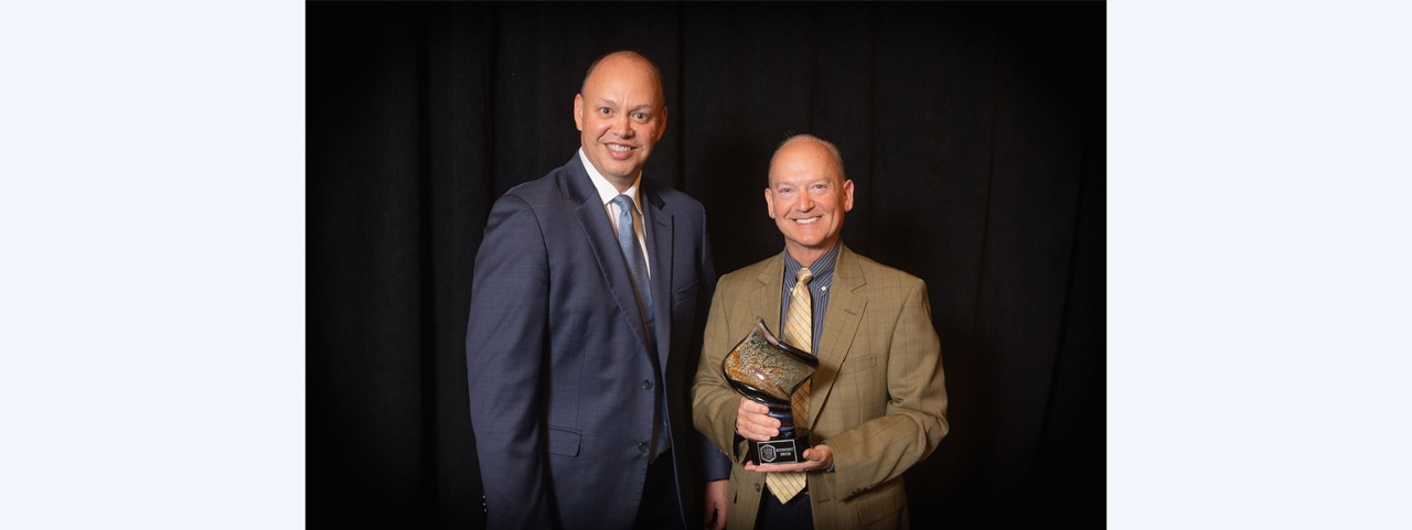 Caption: Acuity Insurance earned the Economic Driver Award from the Wisconsin Economic Development Association (WEDA). WEDA Executive Director Brian Doudna (left) presents the award to Wally Waldhart, Acuity Vice President – Sales and Communications at the recent Community & Economic Development Awards program.