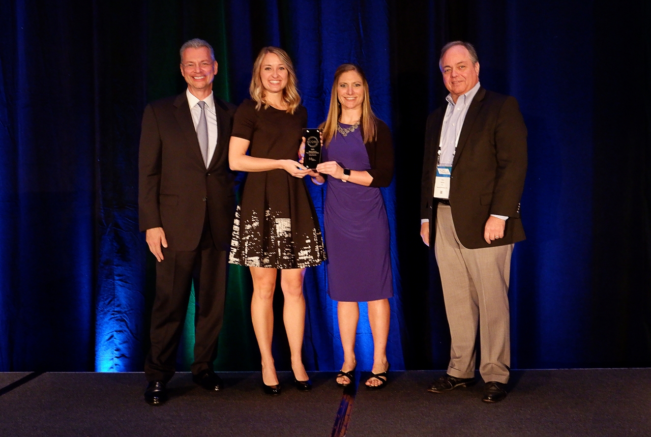 Accepting Acuity’s ACORD Millennial Women's Insurance Advancement Award from Bill Pieroni, President and CEO of ACORD (far left) and ACORD Board of Directors member Tony Mattioli (far right) were Margaret Stanskas, Commercial Lines Underwriter (center left) and Tricia Tienor, Manager -Information Systems. Tricia is one of Acuity’s youngest managers, and Margaret is a recent college graduate who had worked as an intern at Acuity before becoming a full-time employee last year.