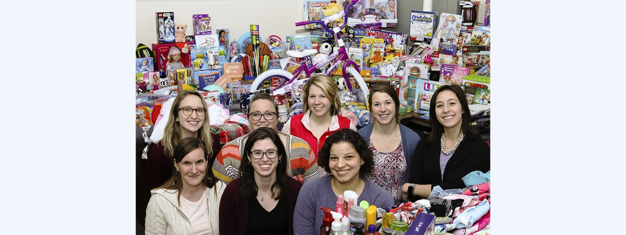 Acuity Gift Drive: From left to right, members of Acuity’s Employee Activity Committee (EAC) who organized the gift drive are (front row left to right) Rachel Mylius, Hannah Favret, and Sanja Boor; (back row left to right) Kat Weber, Michelle R Miller, Kate Jaehnke, April Batzler, and Monica Rincon Hart.